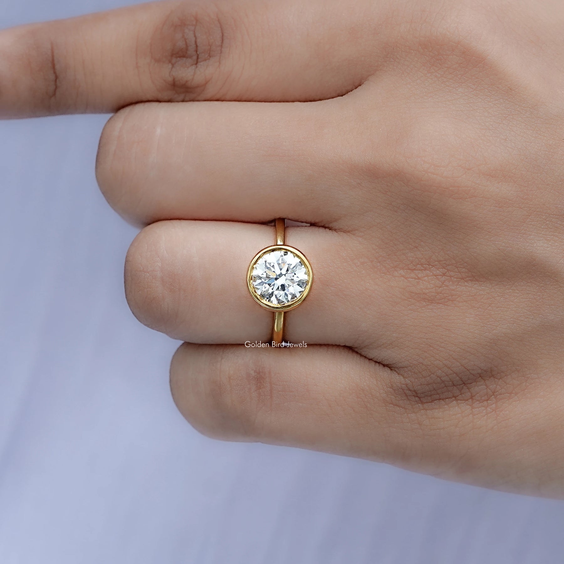 Detailed view of Round Cut Lab Diamond Bezel Set Ring