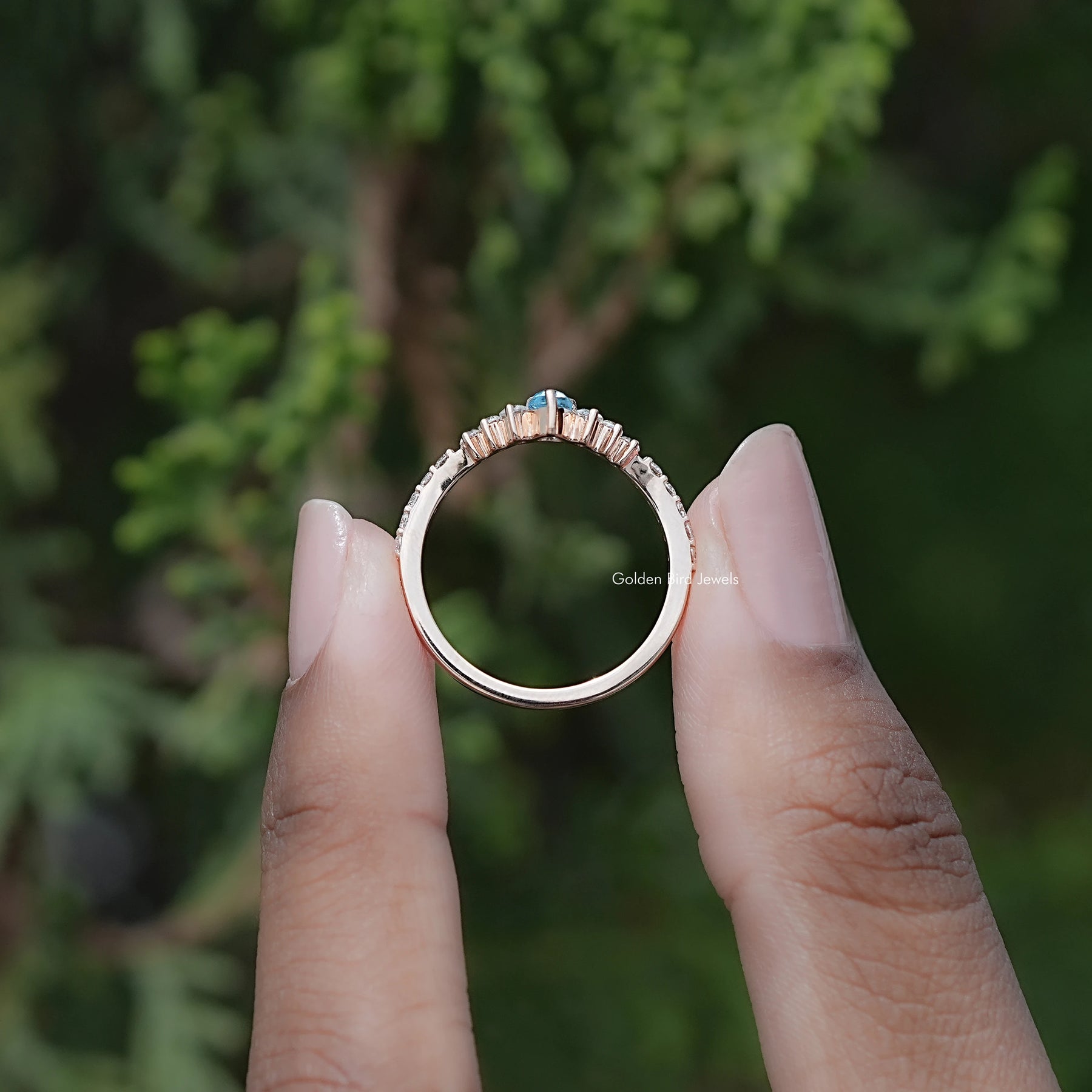 Back view of Marquise Cut Moissanite Solitaire Ring in secure setting