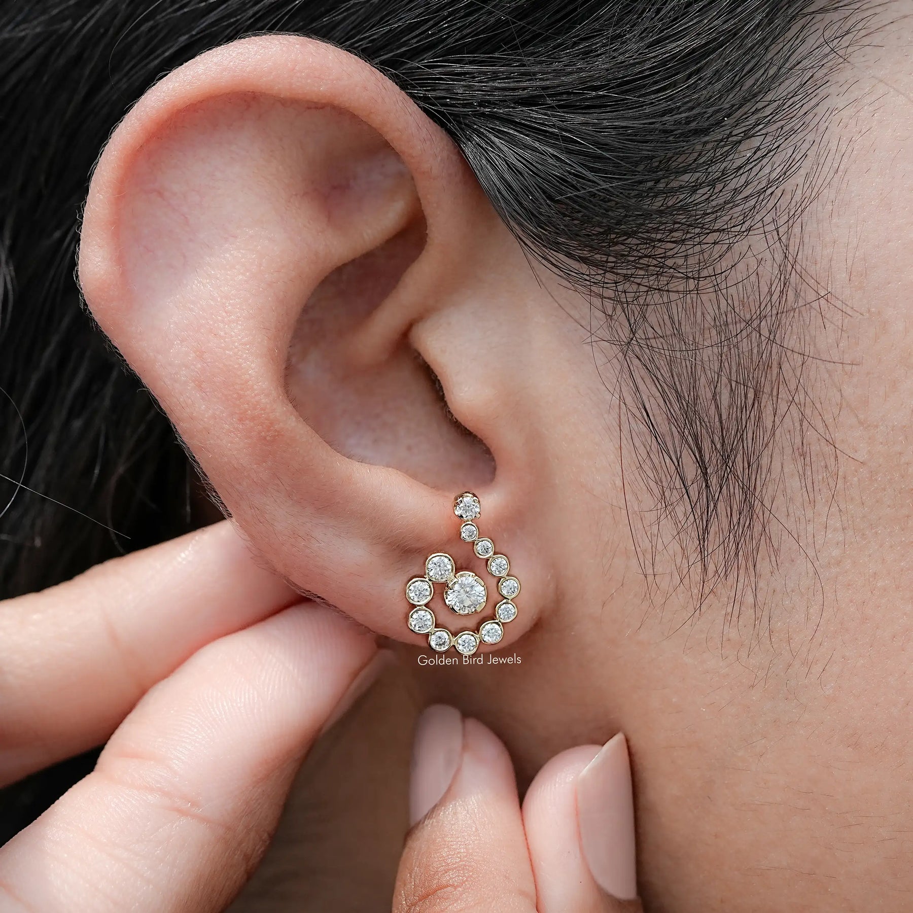 Detailed View Of Round Cut Moissanite Earrings in Bezel Setting