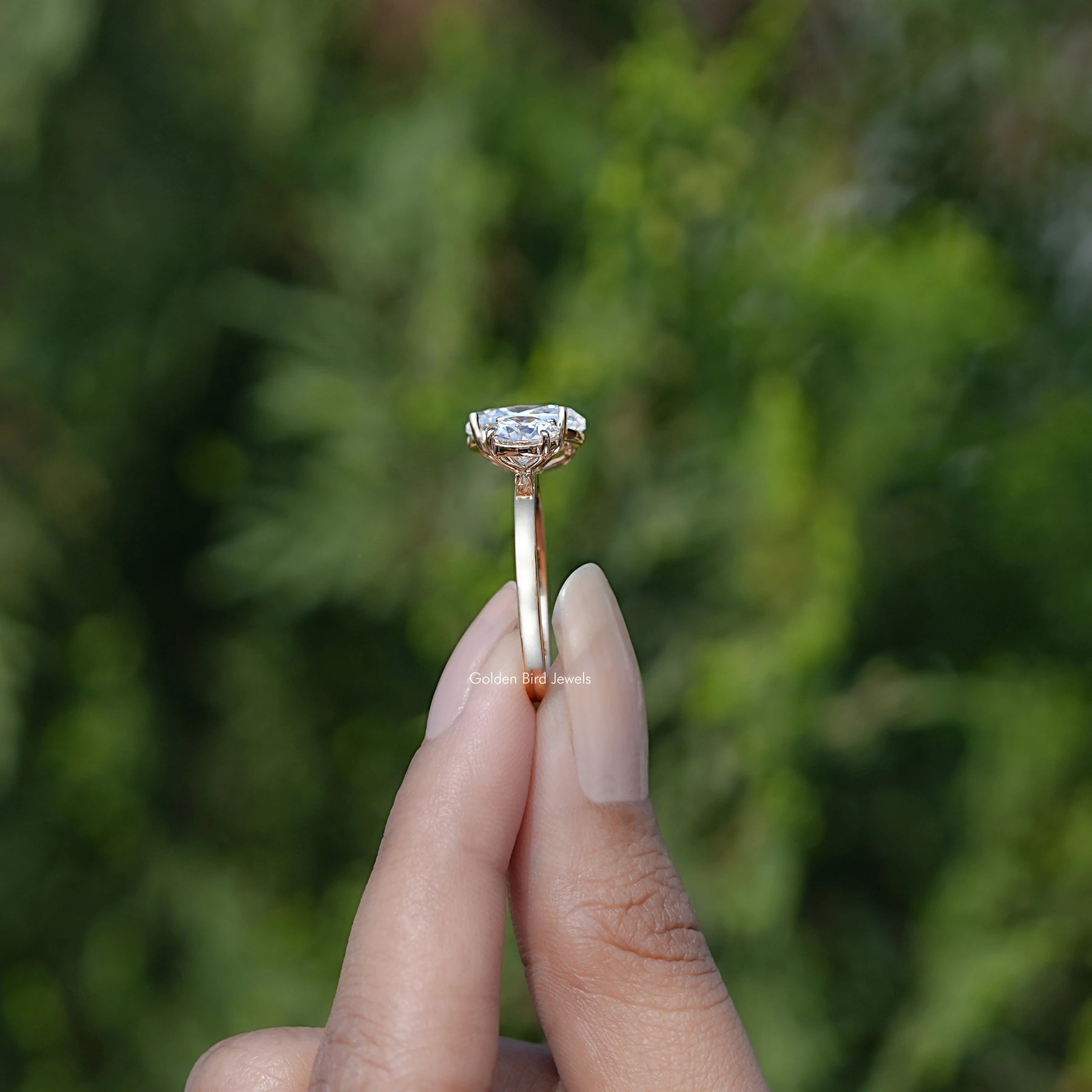 Side View Of Oval And Round Cut Moissanite Toi Et Moi Ring