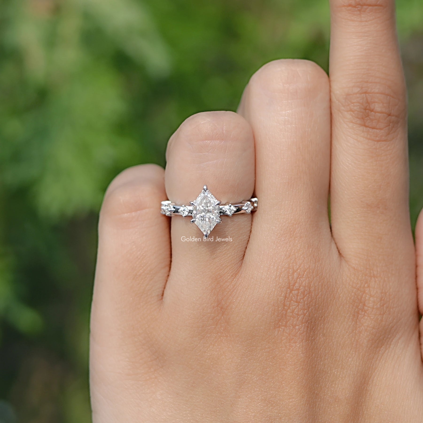 In finger front view of Dutch Marquise Cut Moissanite engagement ring