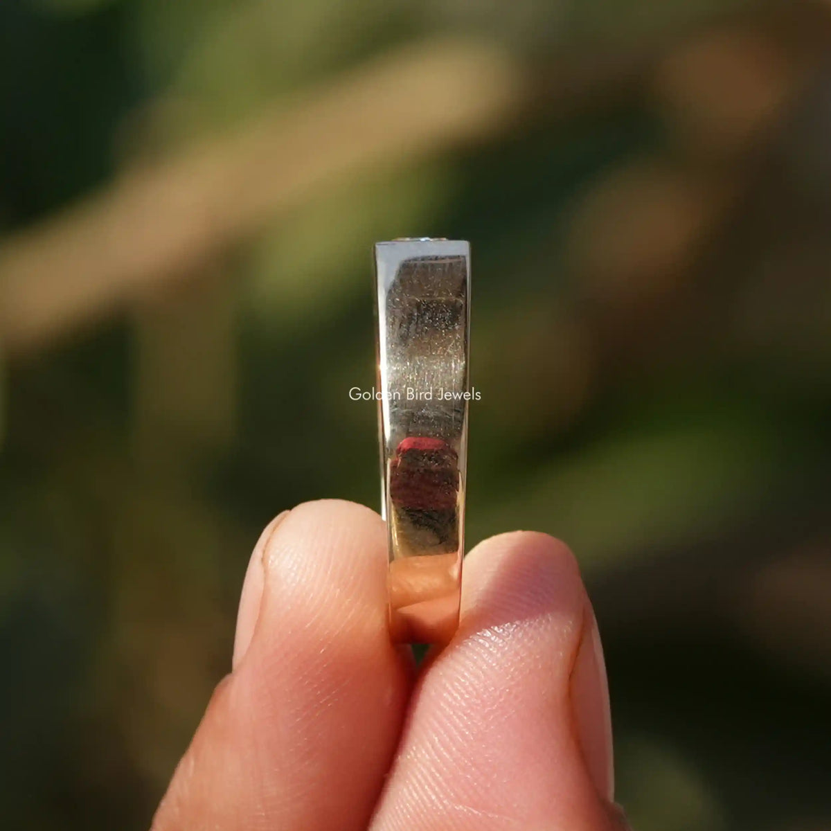Side View of Moissanite Princess Cut Men's Ring In two fingers
