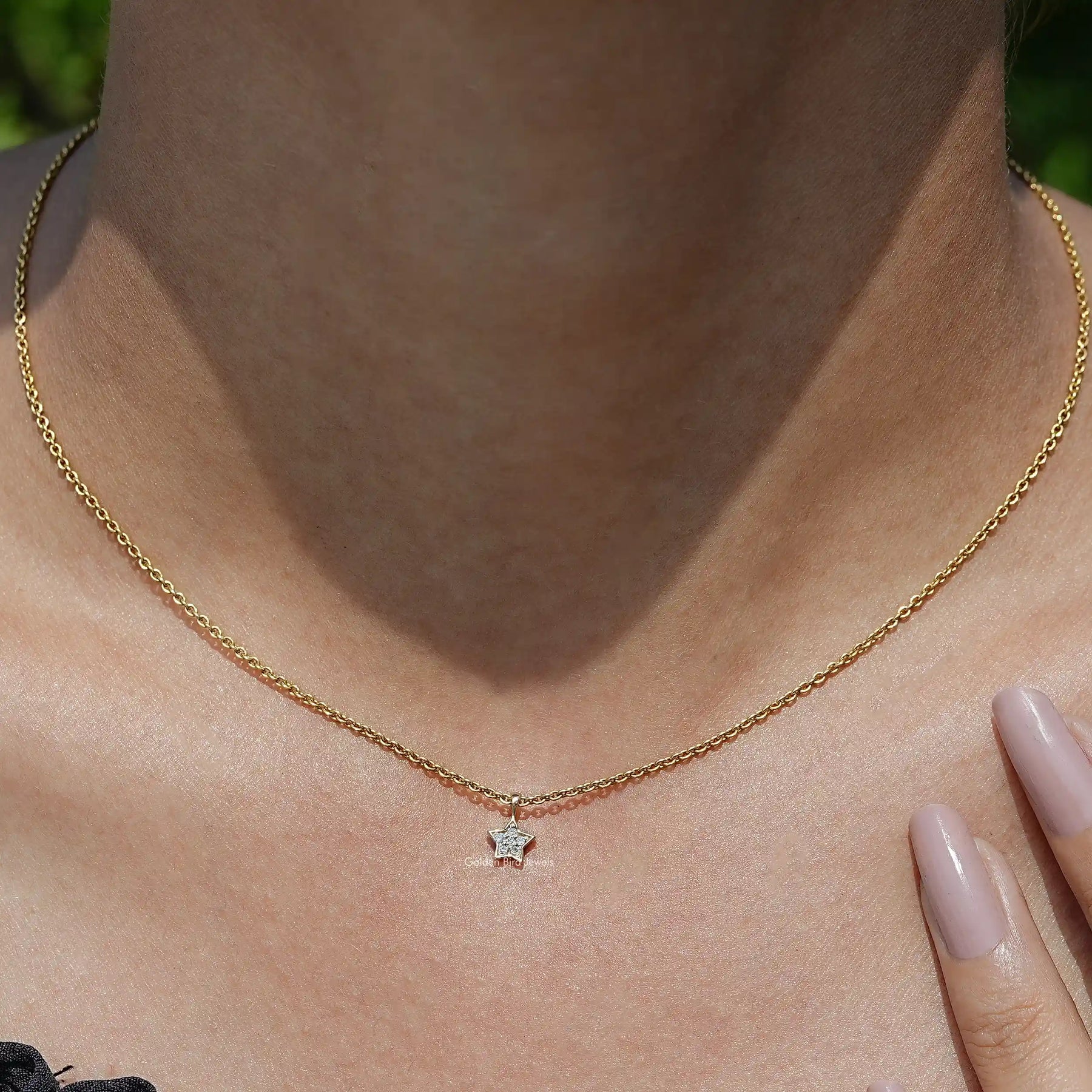 View of Star Shaped Round Cut Diamond Pendantā In Yellow Gold