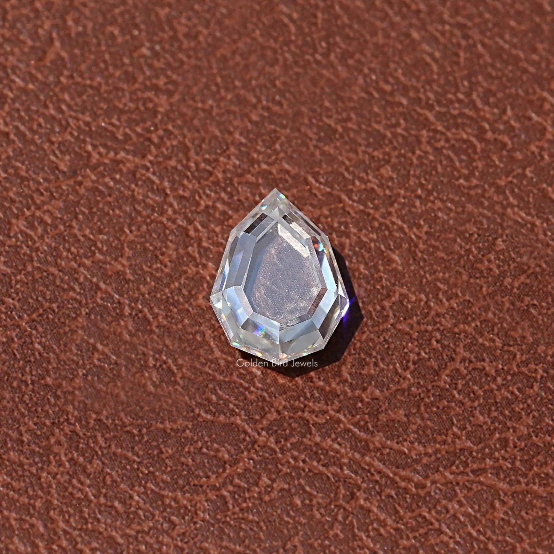 Top View of  Step Cut Portrait Pear Loose Moissanite
