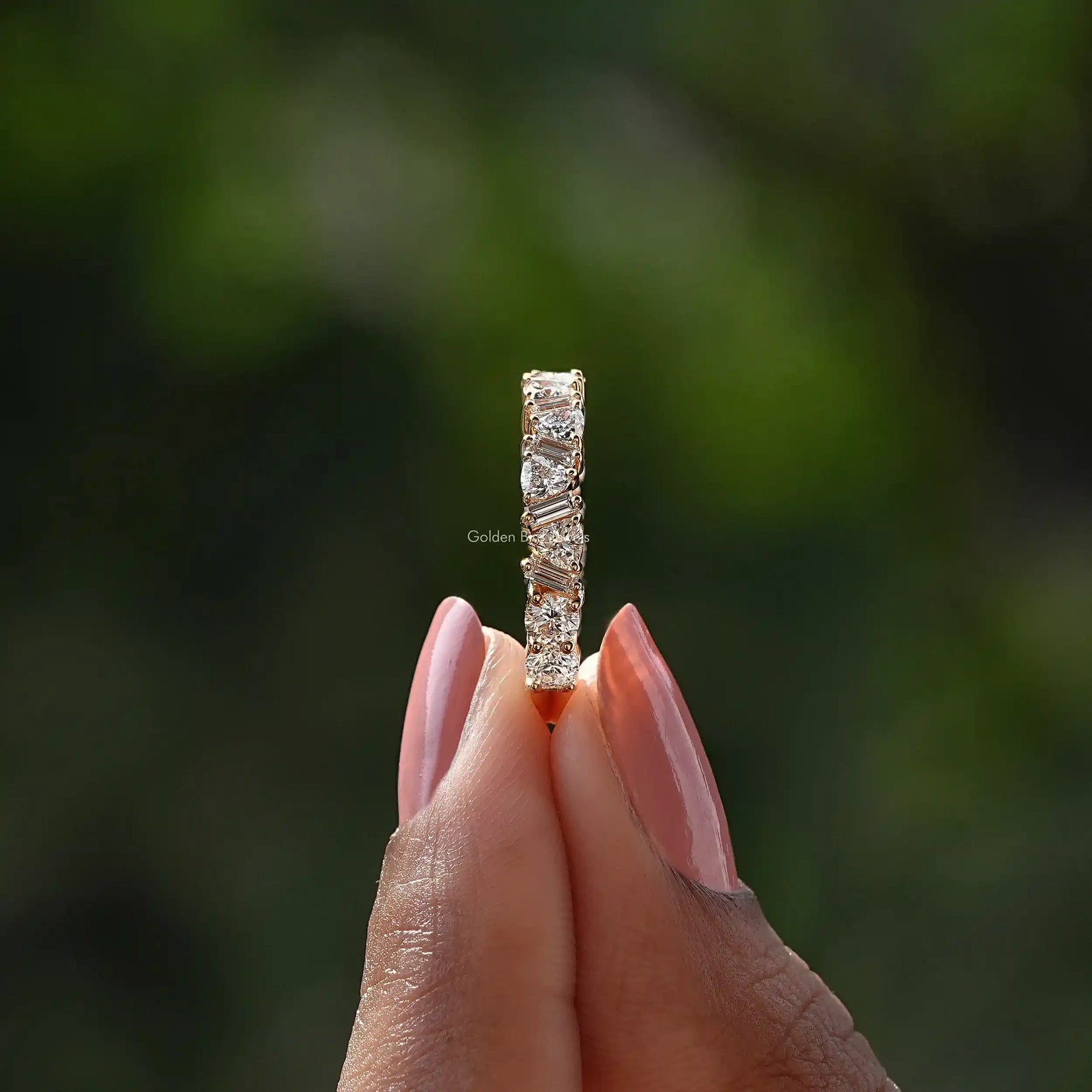 Side View of Baguette and Trillion Cut Diamond Eternity Ring