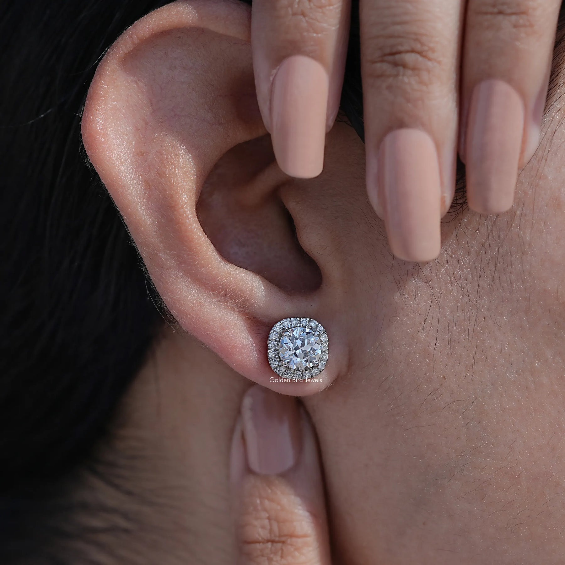 Front View of Vintage European Round Cut Halo Earrings In White Gold