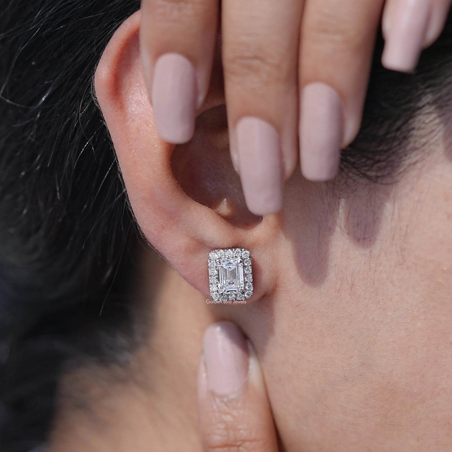 Close-Up View of Emerald Cut Diamond Studs Earrings In White Gold