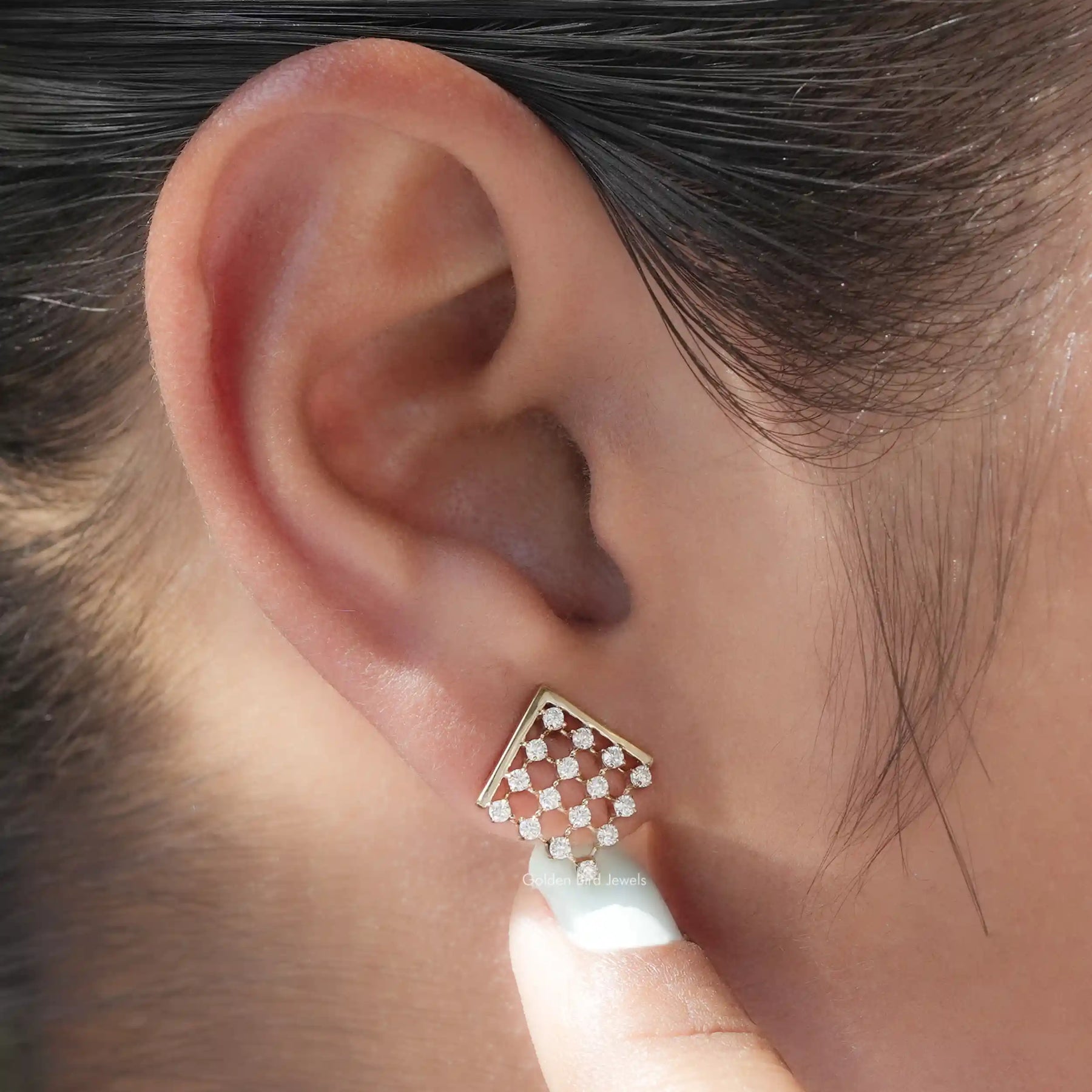 Detailed view of moissanite earrings in secure setting
