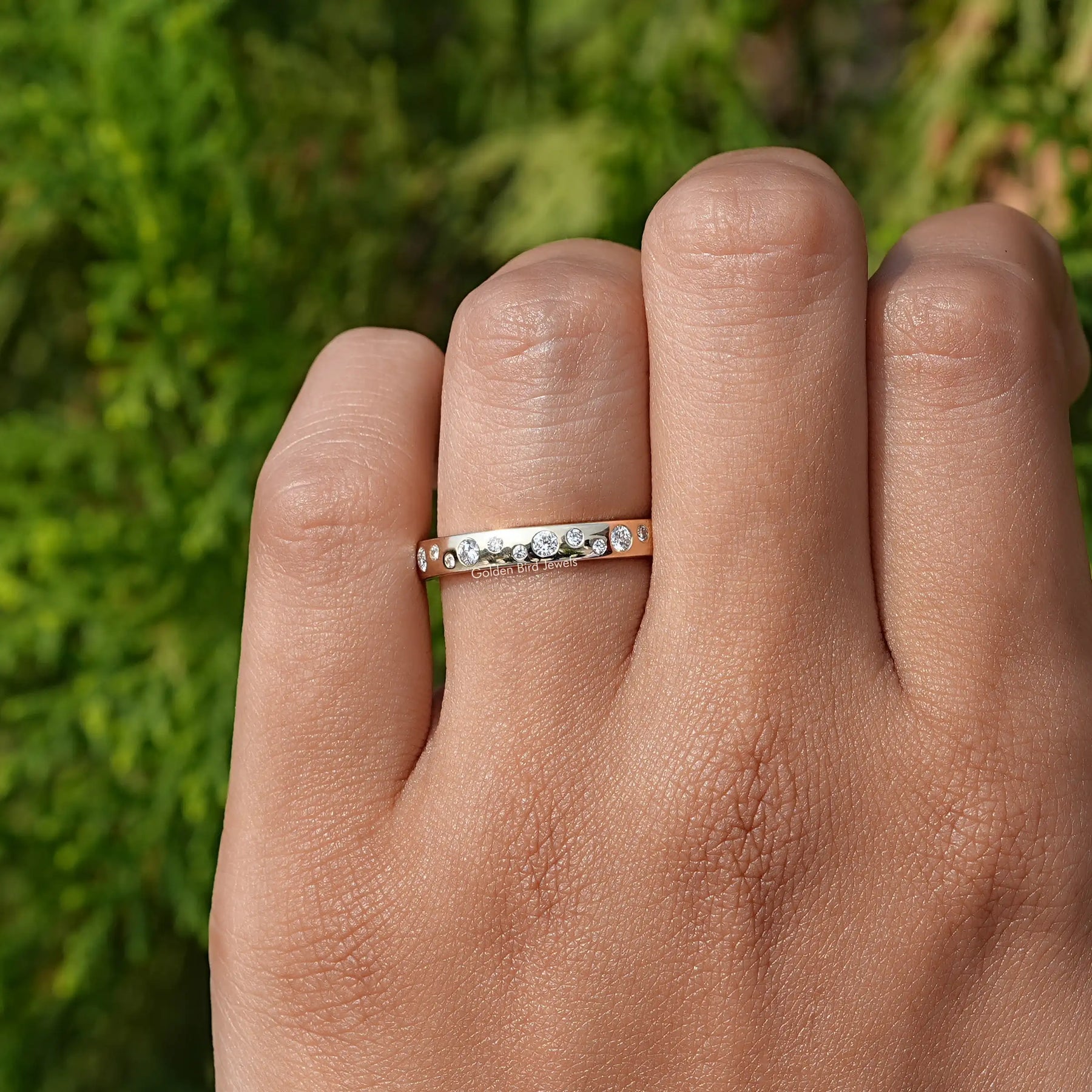 View of Round Cut Flush Set Eternity Band In Finger