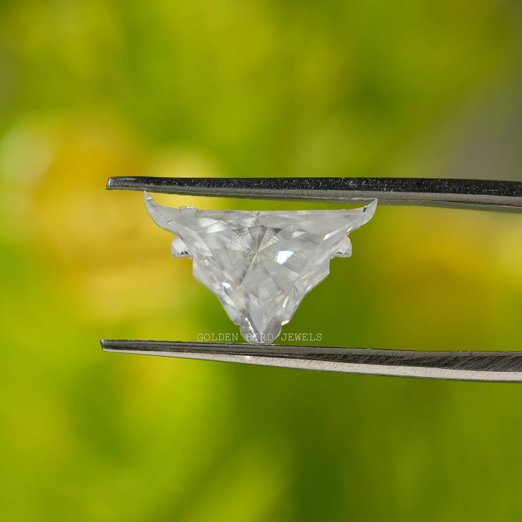 Colorless antique bull face cut moissanite stone