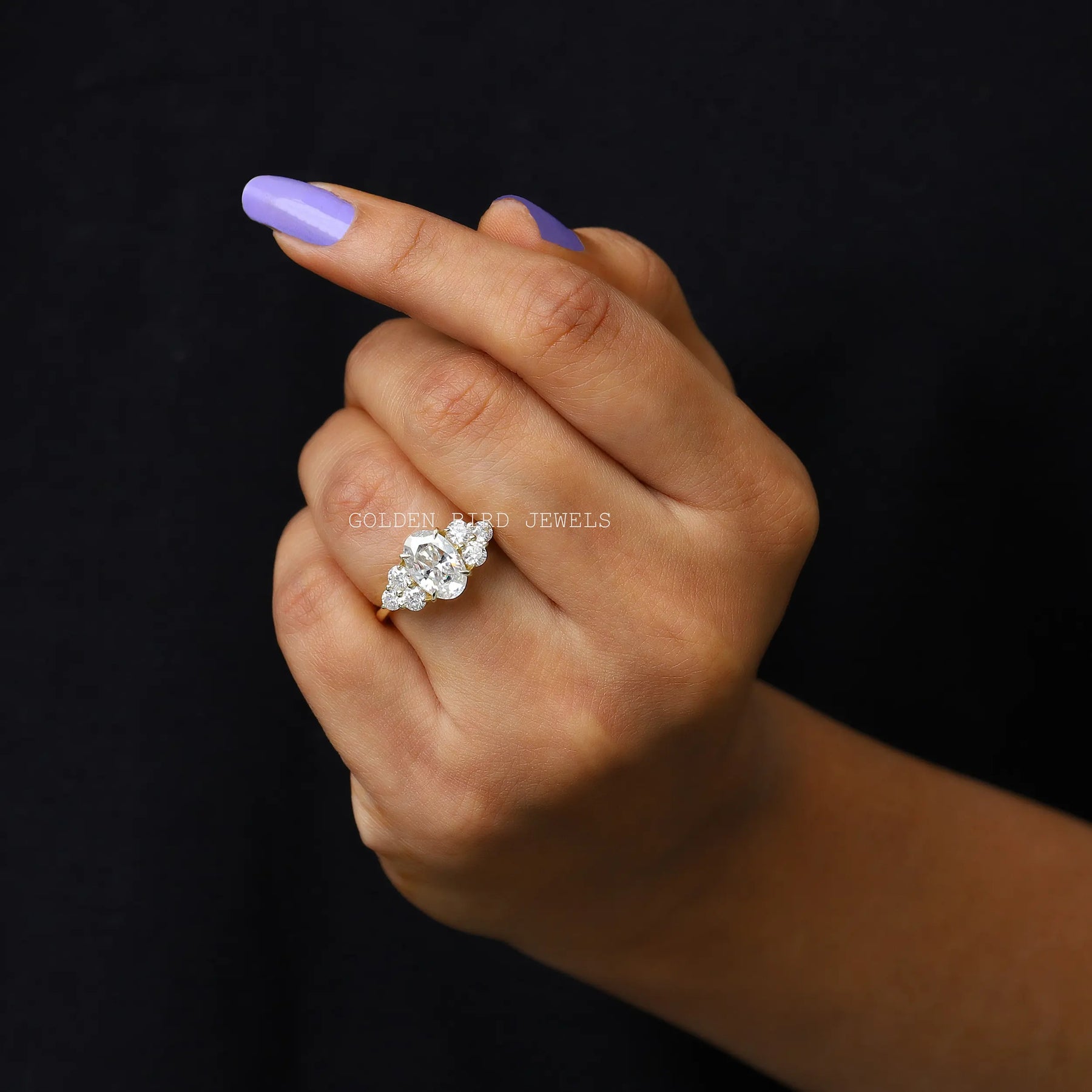 Finger view of cluster moissanite  engagement ring