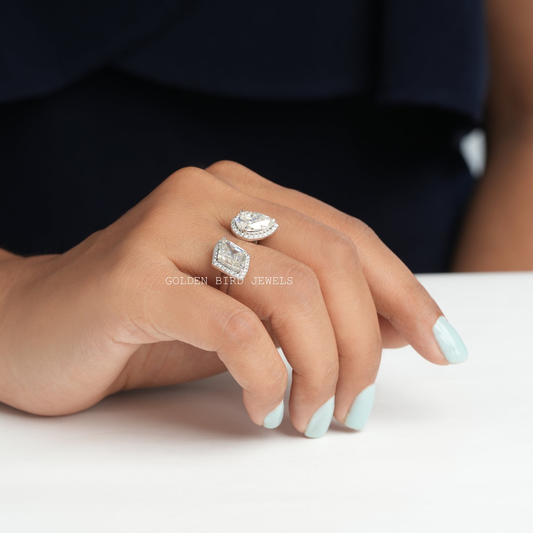 Front view of  2 stone halo moissanite engagement  ring