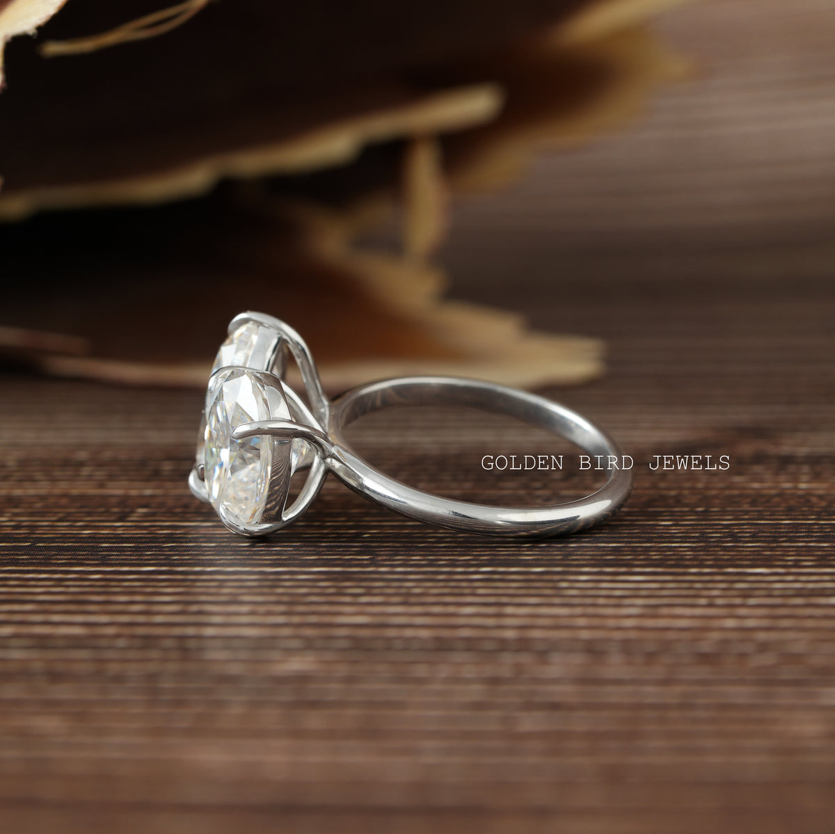 View of Toi Et Moi Pear And Oval Cut Moissanite Ring In Finger