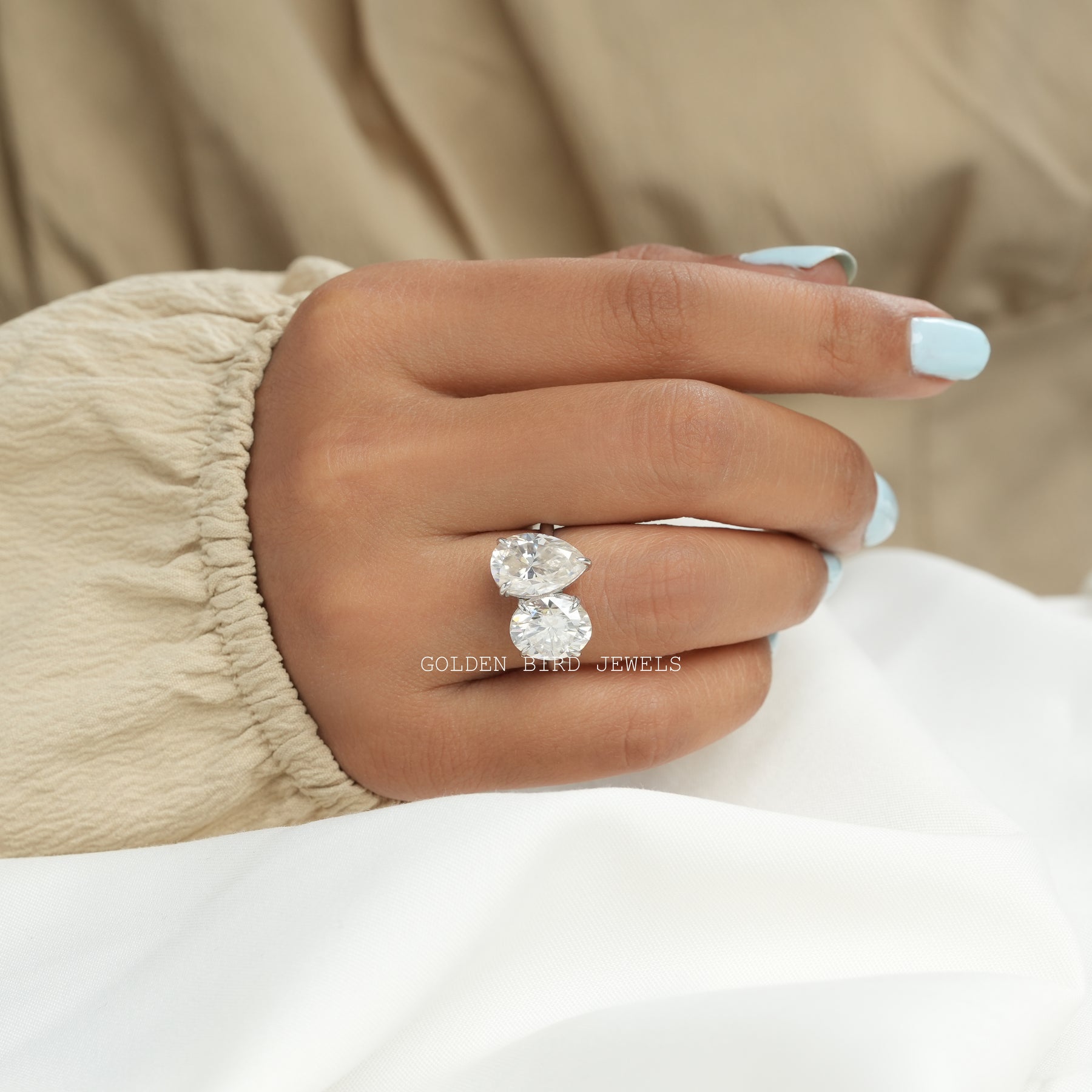 View of Toi Et Moi Pear And Oval Cut Moissanite Ring In White Gold