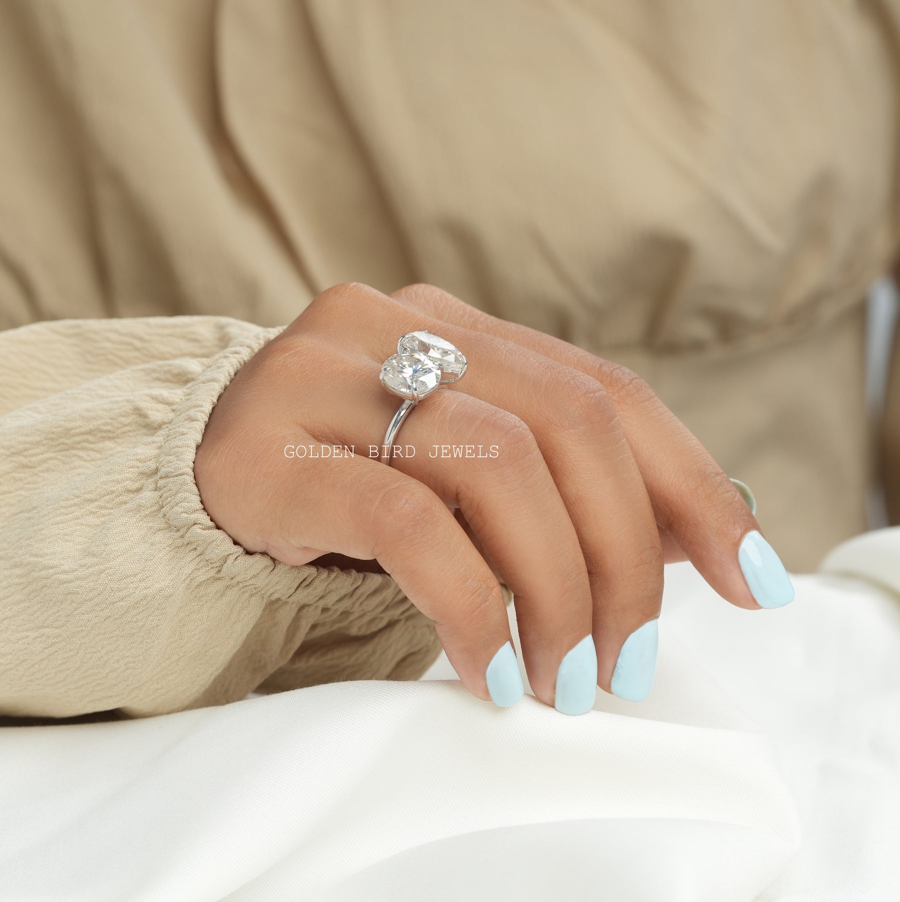 View of Toi Et Moi Pear And Oval Cut Moissanite Ring In Finger