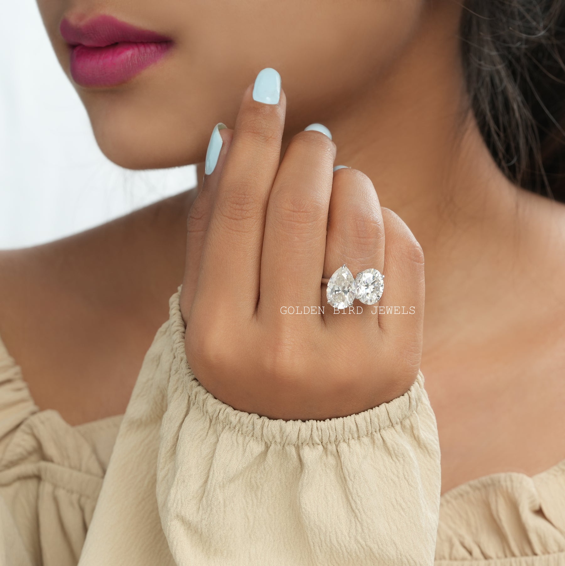 View of Toi Et Moi Pear And Oval Cut Moissanite Ring In White Gold