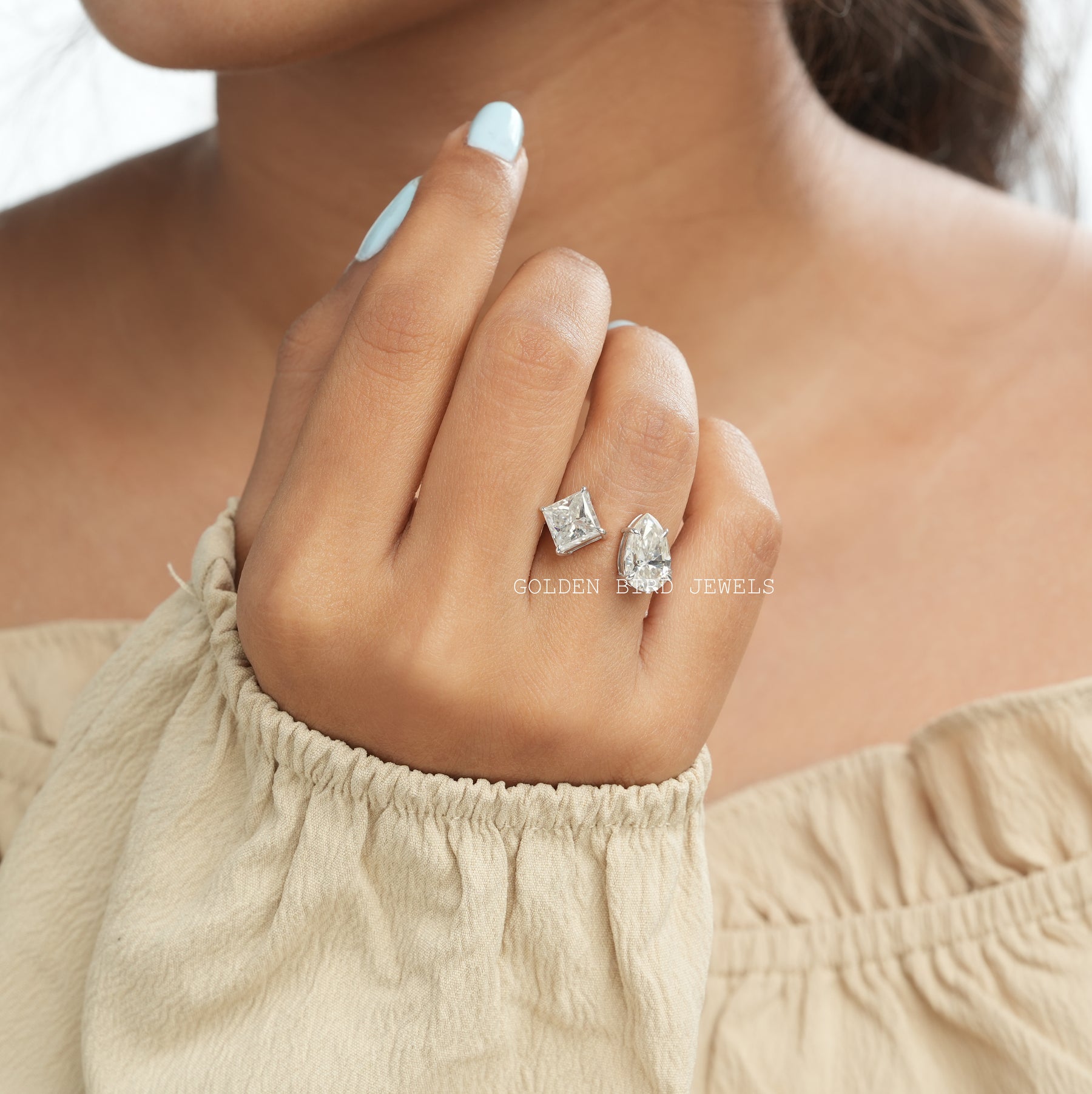 View of Moissanite Toi Et Moi Engagement Ring In Finger