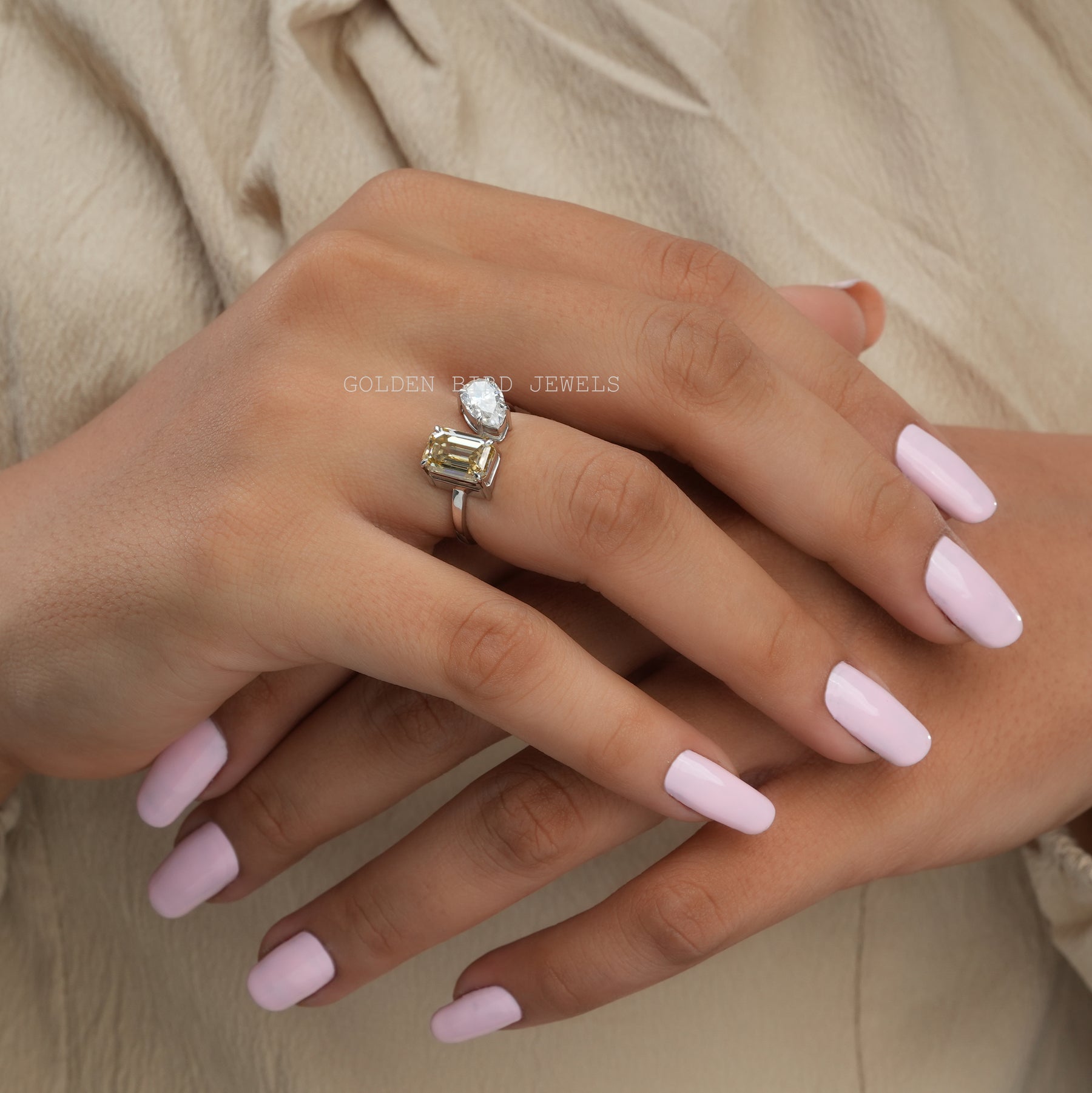 View of Emerald Cut Toi Et Moi Moissanite Ring In Finger