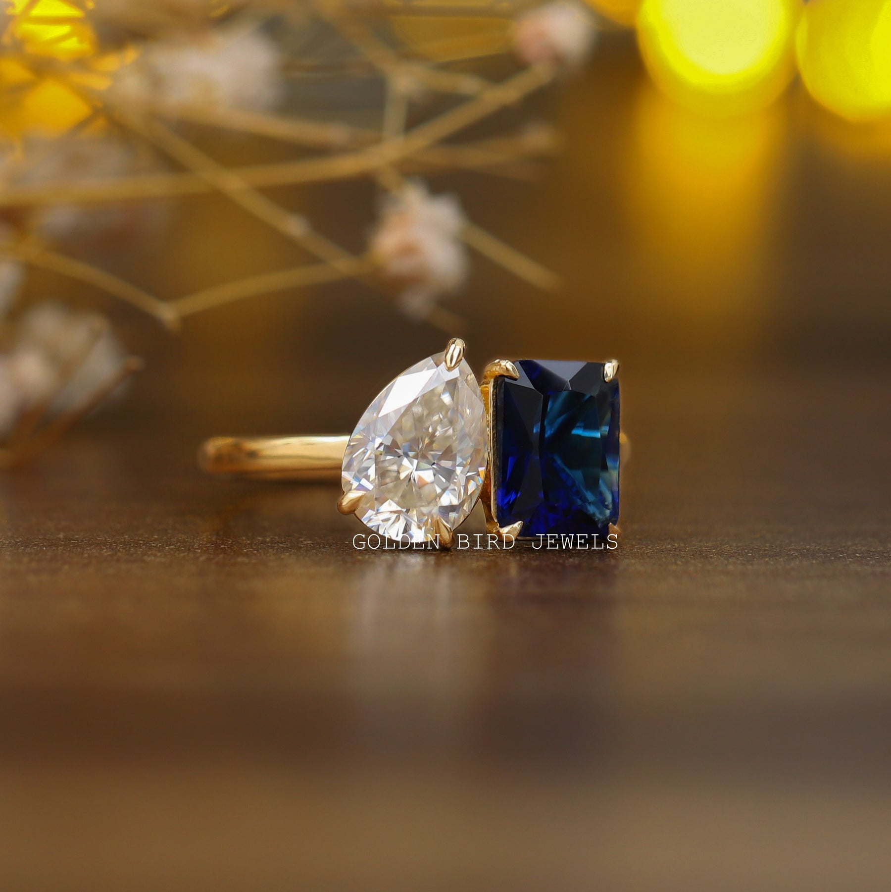 View of Emerald & Pear Cut Toi Et Moi Engagement Ring Made In 14k Yellow Gold