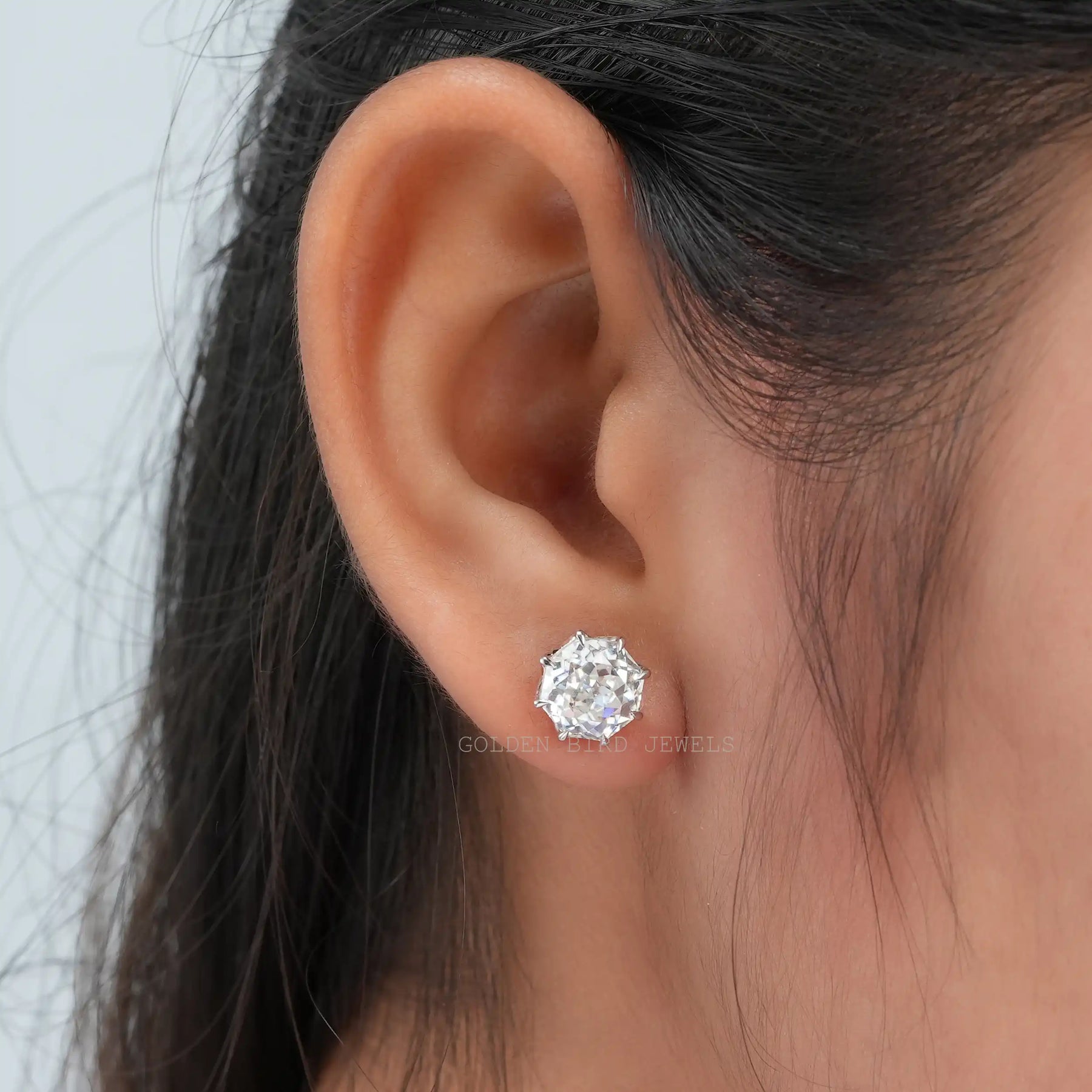 In Ear view of octagon Cut moissanite Stud Earrings
