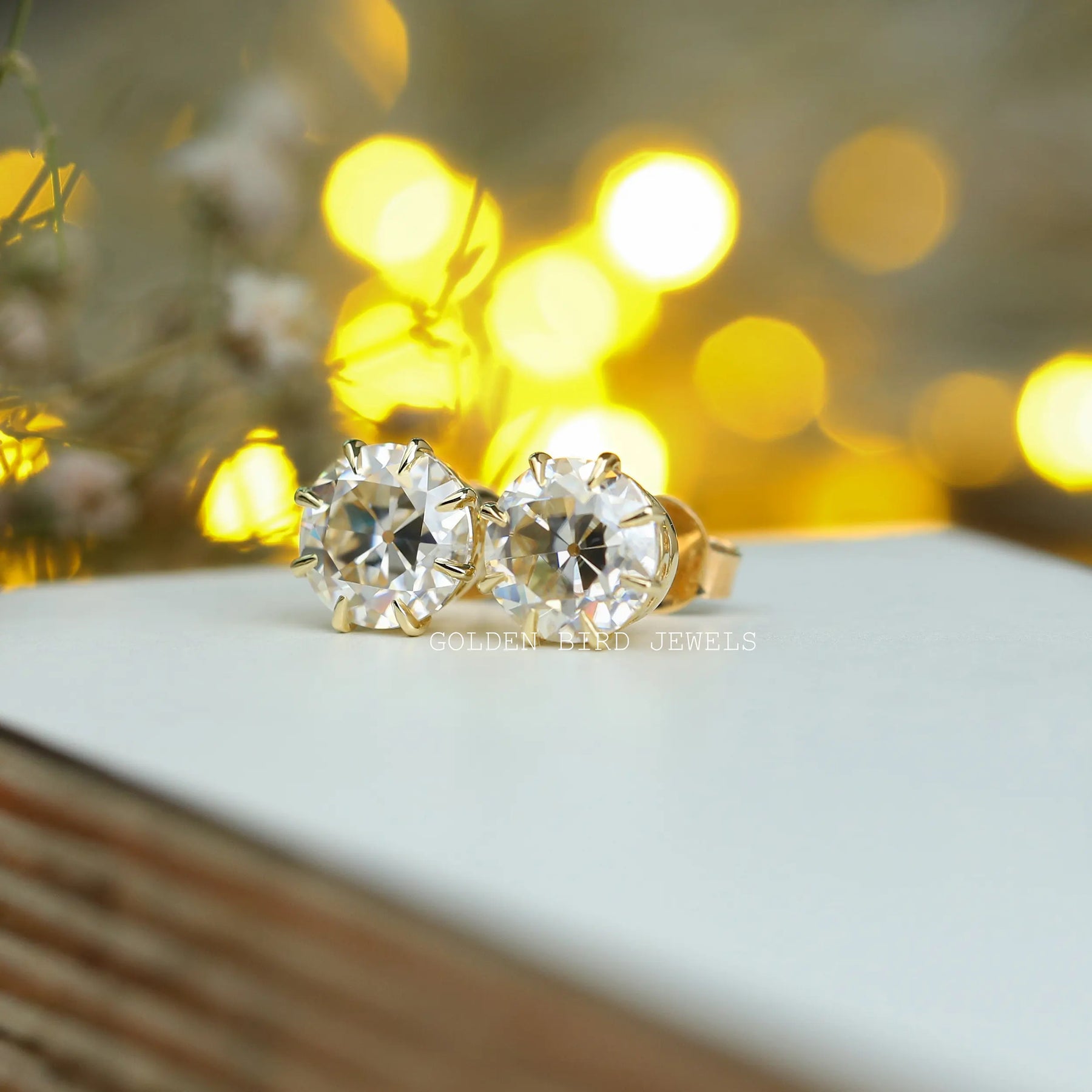 Detailed view of moissanite earrings in secure setting