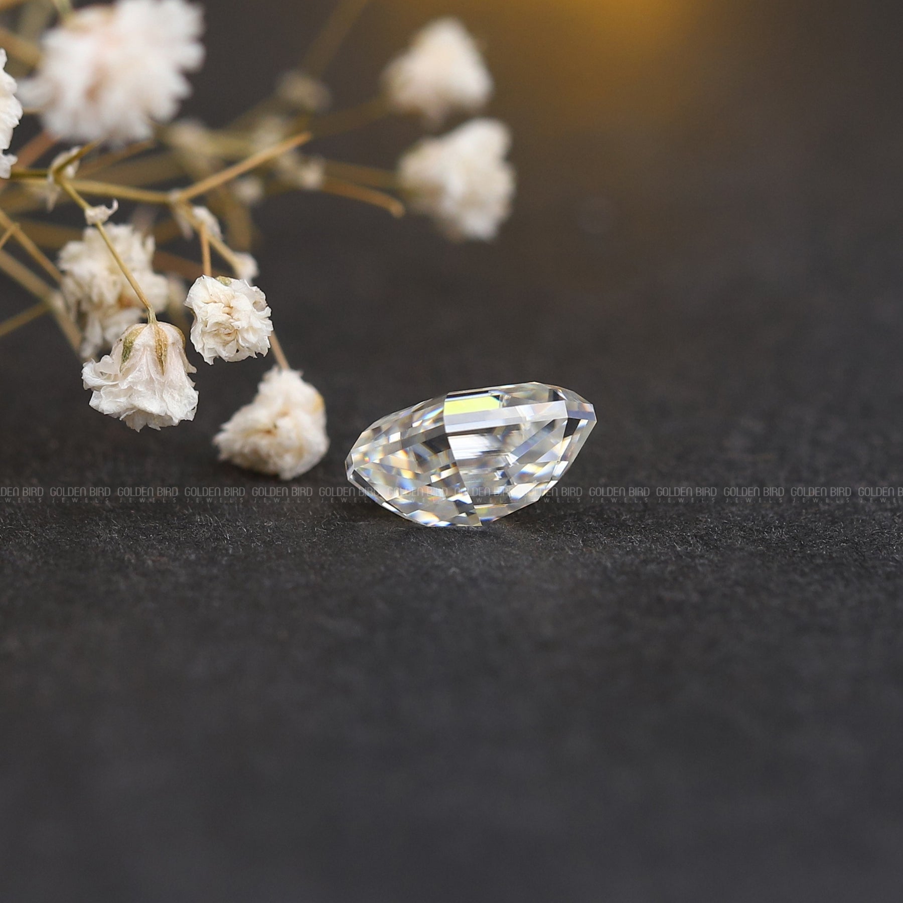 Side View of  Step Cut Moval Loose Stone In White Gold