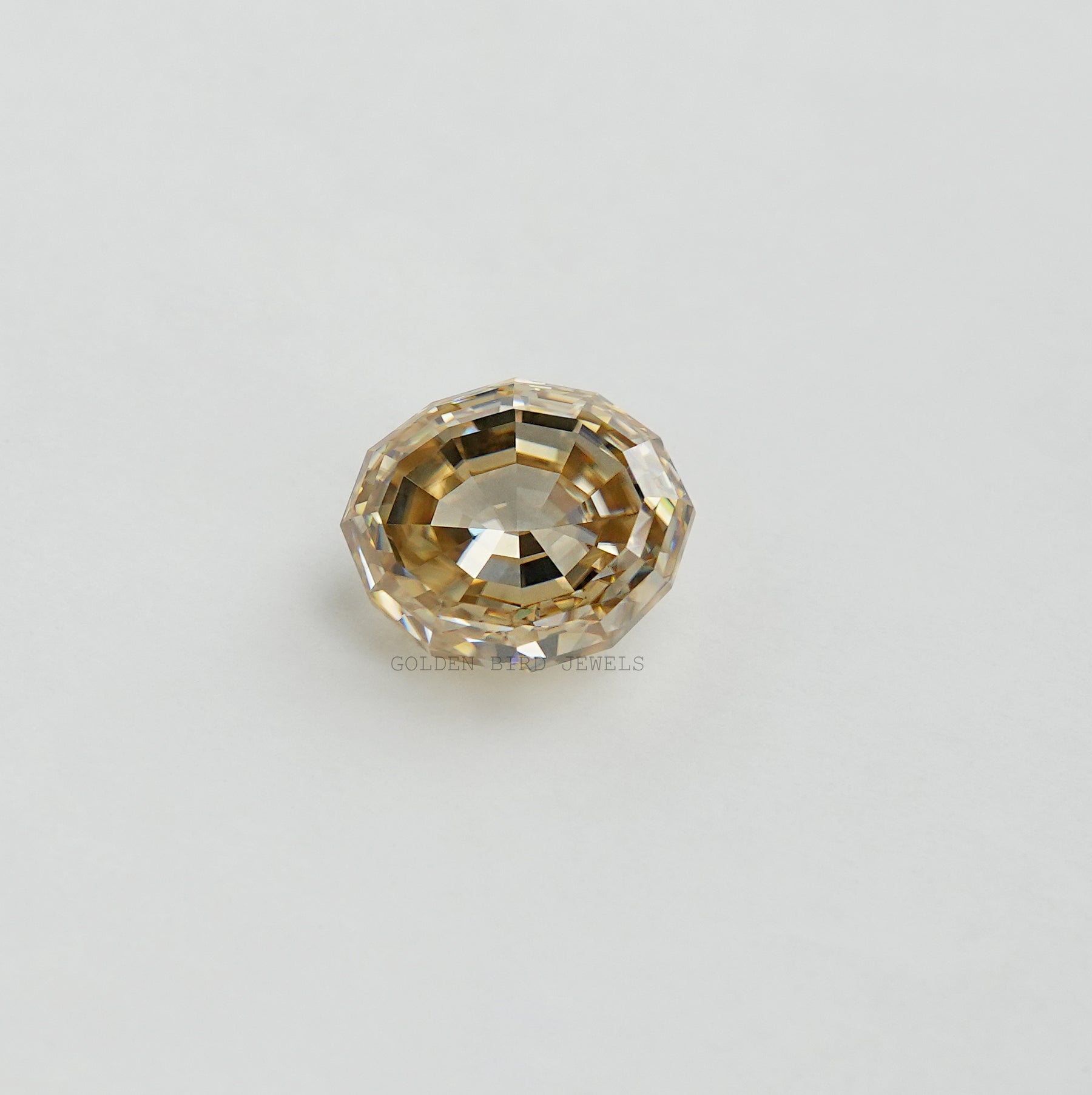 Close View Of Yellow Step Cut Oval Shape Loose Moissanite Stone