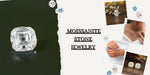 [Displayed Assorted moissanite stone jewelry, including rings, earrings, bracelets, and a pendant against a neutral background] - [Golden Bird Jewels]