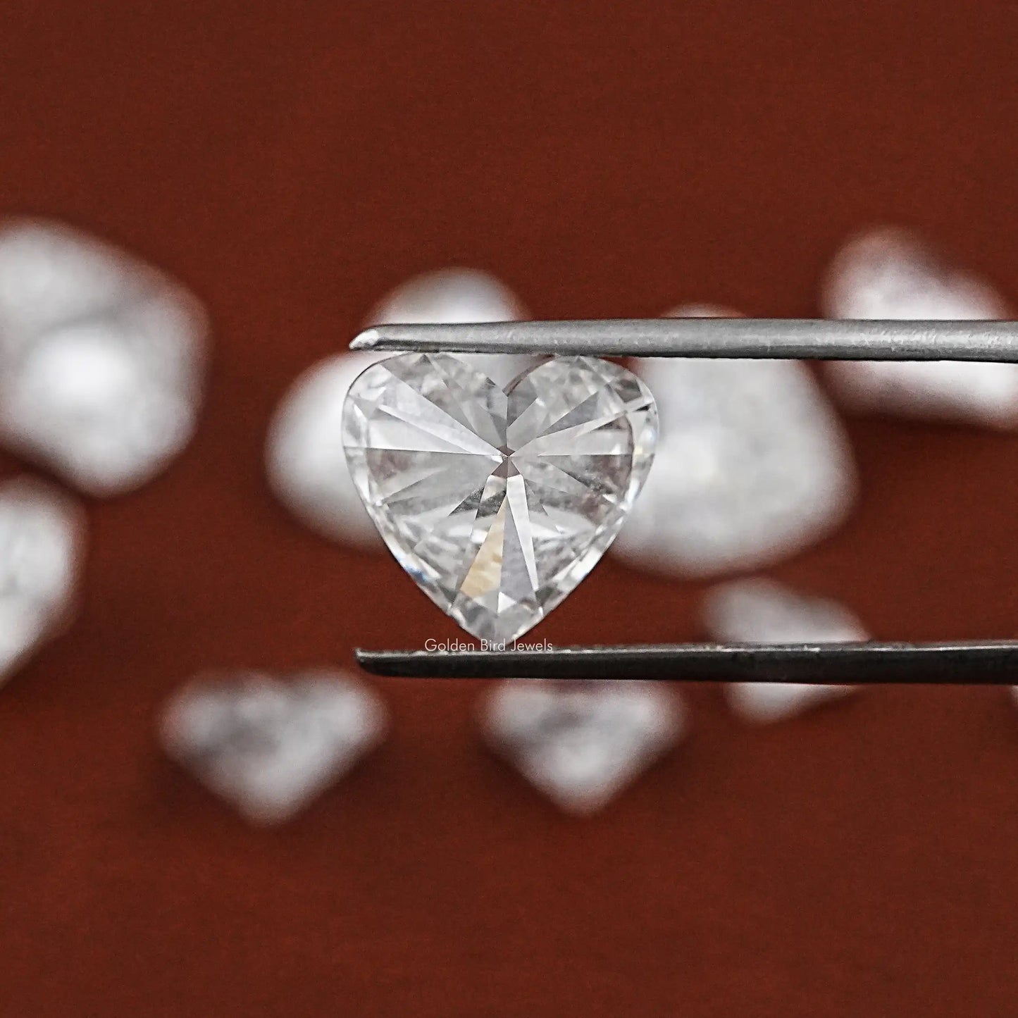 Twijer holding the Heart Shaped Loose Lab Diamond