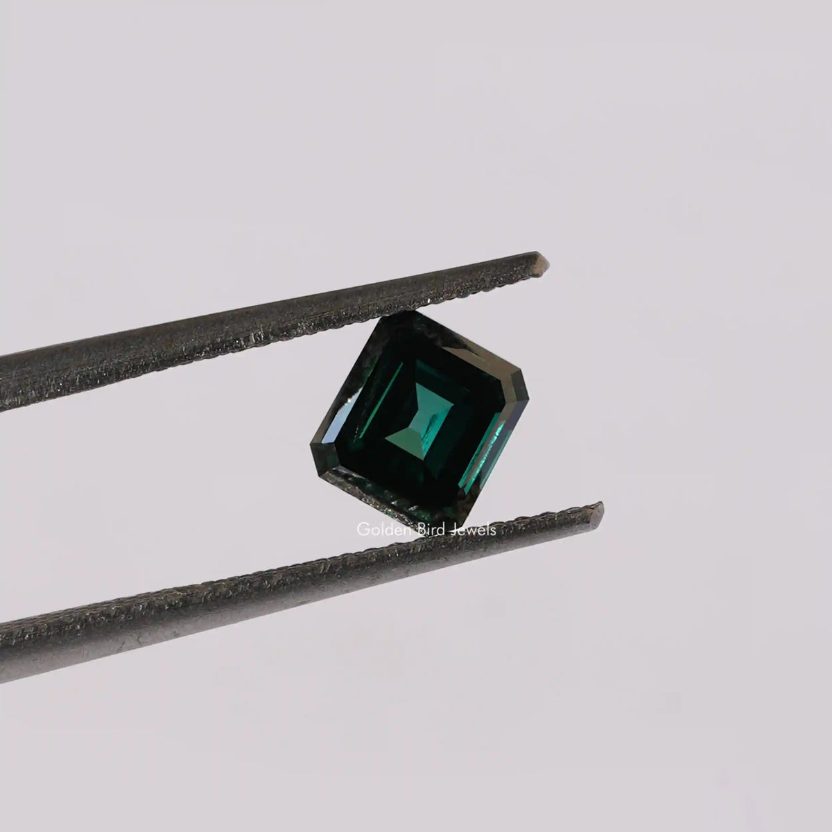 [This dark green asscher cut loose stone made of dark  green color and vs clarity]-[Golden Bird Jewels]