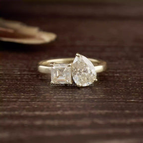 Front view of Asscher and pear cut  moissanite  engagement ring  