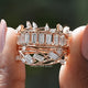 Front view of Baguette Cut Moissanite Bridal Ring Set in two fingers