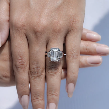 Close view of Bezel Set Emerald Cut Lab Diamond Three Stone Ring