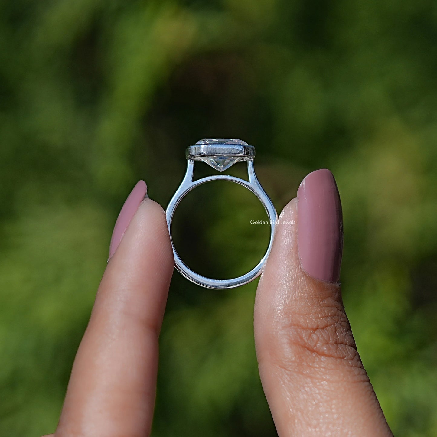 Back view of Radiant Cut Moissanite Solitaire Ring in secure setting 