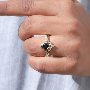 View of Black Pear Cut Moissanite Bridal Ring In finger