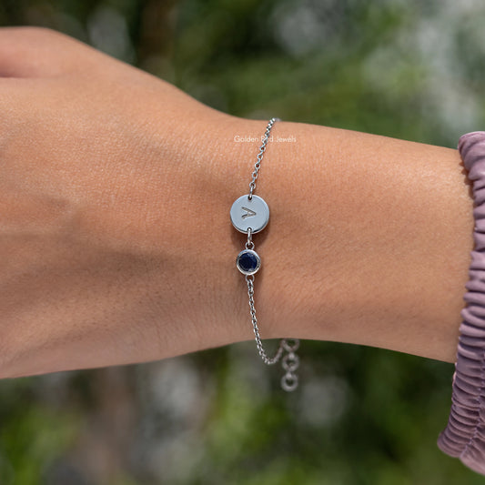 Sterling silver bracelet with letter A charm and round blue gemstone