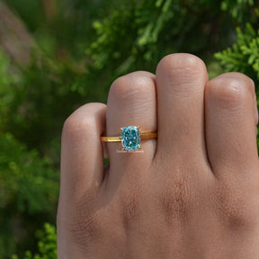 Close-Up View of Cushion Moissanite Engagement Ring In Yellow Gold