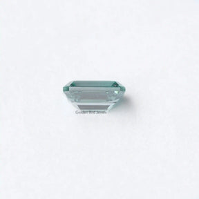 [Botttom view of blue emerald cut loose moissanite made of vs clarity]-[Golden Bird Jewels]