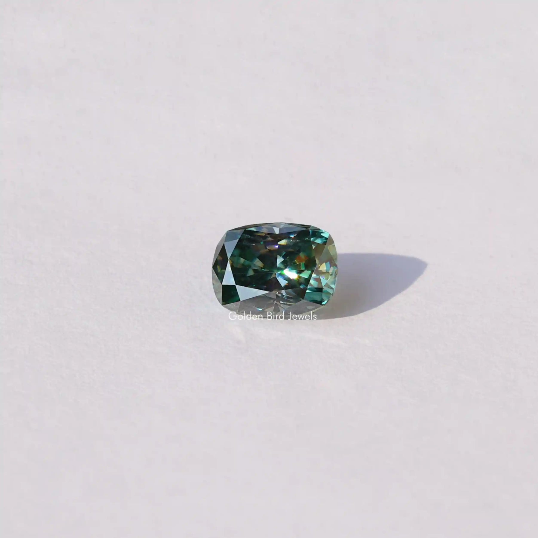 [Front view of blue green cushion cut loose moissanite]-[Golden Bird Jewels]