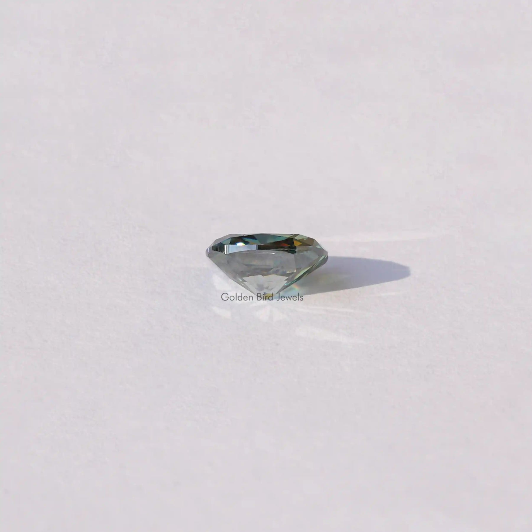 [Bottom view of blue green cushion cut loose stone]-[Golden Bird Jewels]