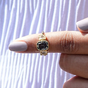 In finger front View of Old Mine Criss Cut And Radiant French Cut 3 Stone Ring