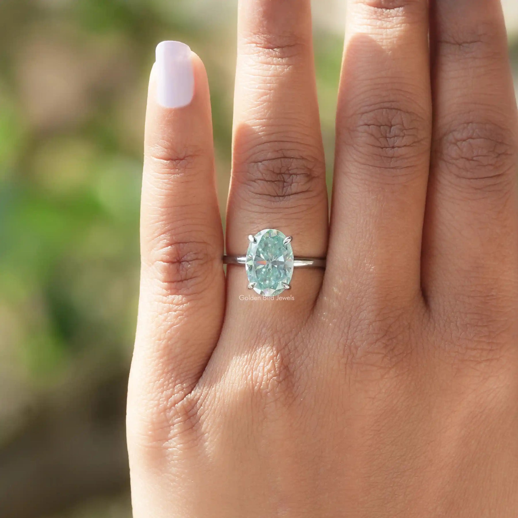 Blue Oval Cut Moissanite Solitaire Ring