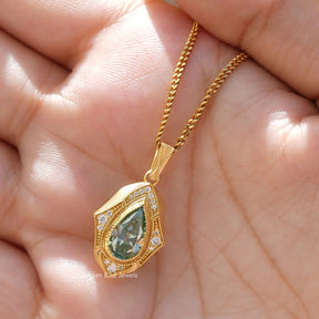 [This pear cut moissanite pendant set in bezel setting]-[Golden Bird Jewels]