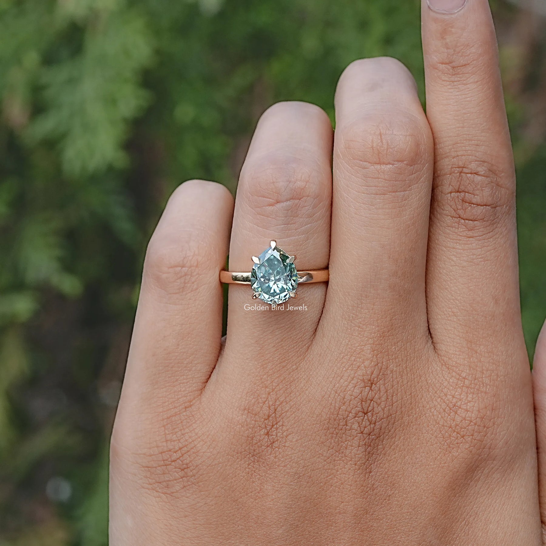 Pear Cut Green Moissanite Solitaire Ring