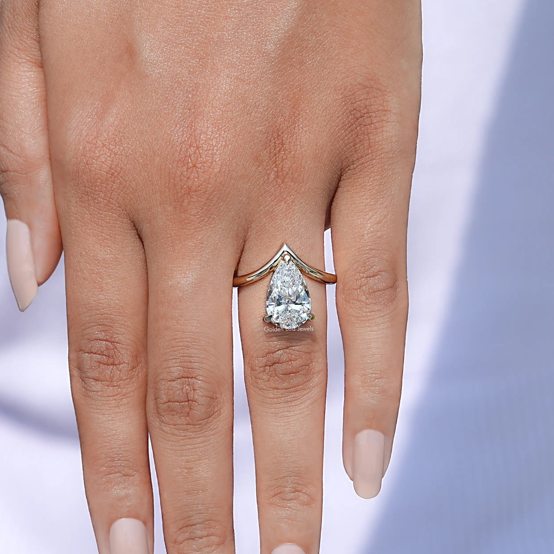 Pear Cut Lab Diamond V Shaped Curved Solitaire Ring