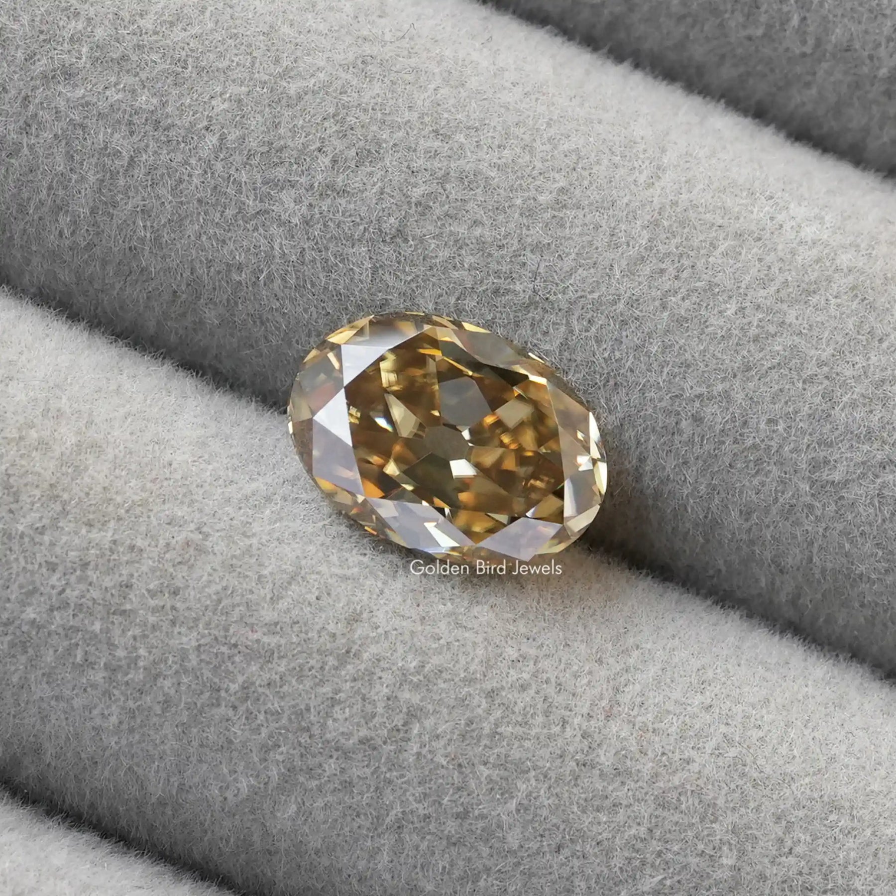 [Front view of brown oval loose moissanite]-[Golden Bird Jewels]