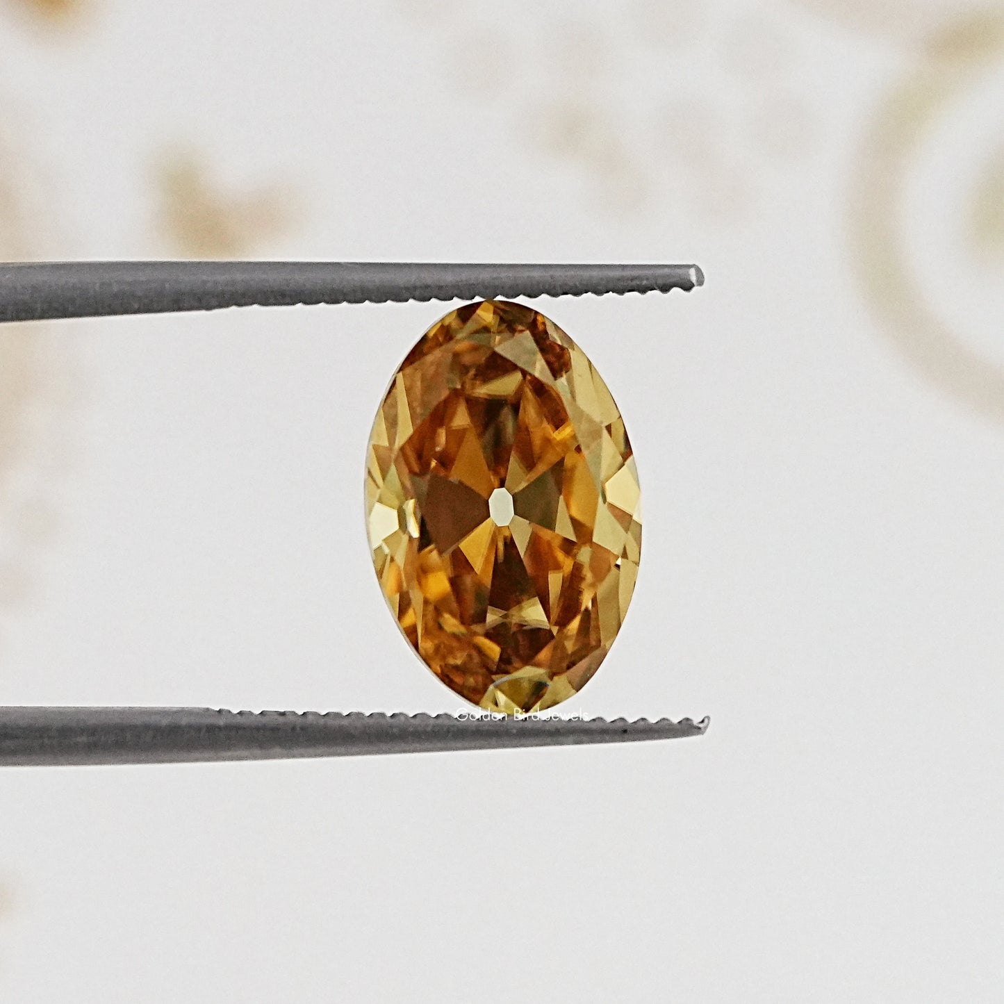 In Tweezer View Of Old Mine Oval Cut Loose Moissanite Stone