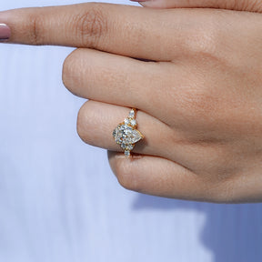 Pear Shaped Moissanite Accent Engagement Ring