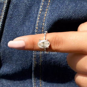 In finger front View of Crushed Ice Oval Cut Moissanite Ring