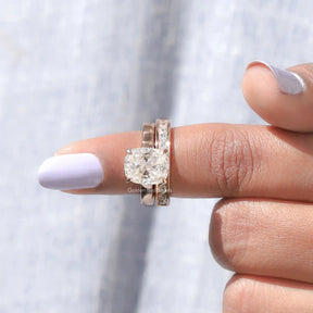 In finger front View of Moissanite Cushion Cut Bridal Ring Set